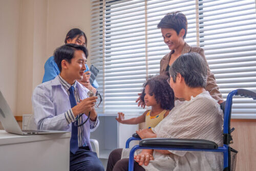 At hospital room patient sit on wheel chair consult doctor on heart beat prepare for stethoscope